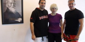 Antonio Quero junto con el otro profesor del curso y la judoka Carmen Herrera